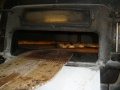 Pan cociendose en el Horno de leña de la Panadería de San José de Torre Cardela.jpg