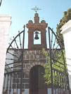 Puerta de la ermita de Nuestro Padre Jesús, situada en esta calle.